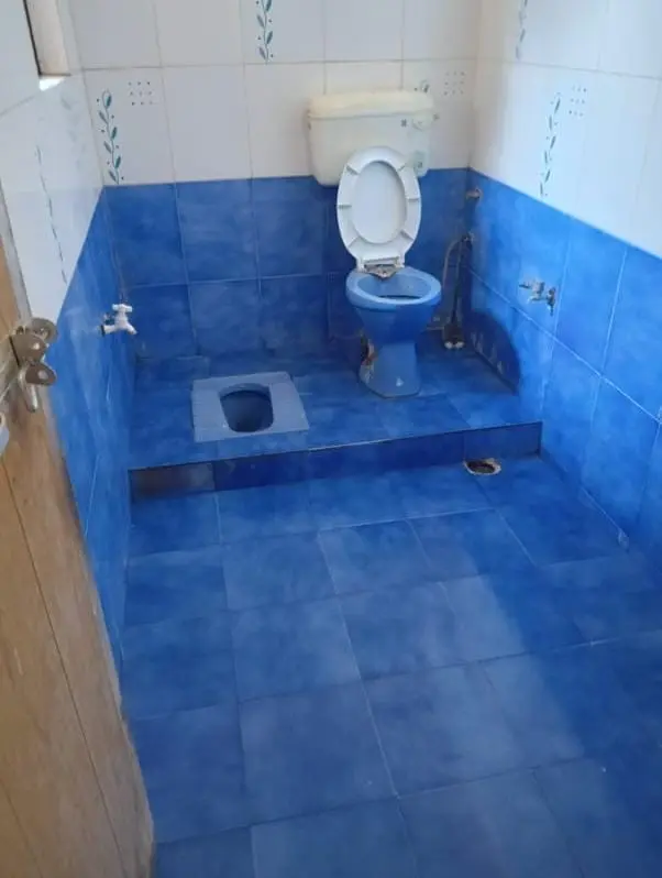 Sparkling clean bathroom tiles after service